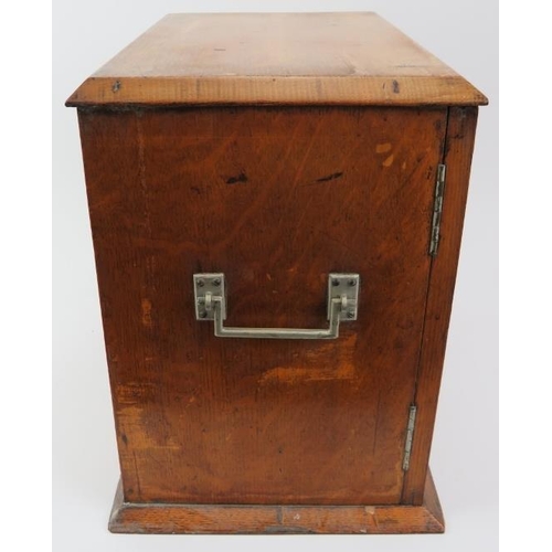 38 - A vintage smokers compendium, circa 1920/30s. With twin doors opening to reveal two draws above a re... 