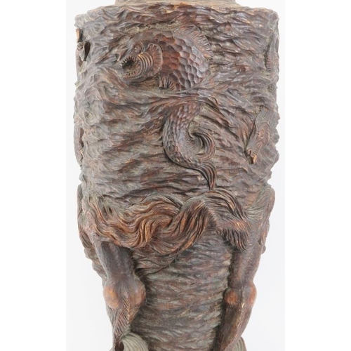 41 - A large nautical mermaid vase hand carved in wood, signed J Vainaukas and dated 1941. Of amphora for... 