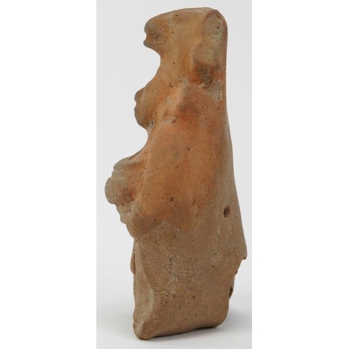 45 - A pre-Columbian terracotta figure, Guatemala, Mesoamerican region. Modelled  in ceremonial attire we... 