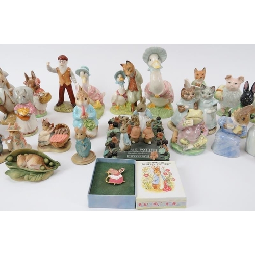 46 - A large collection of Beatrix Potter ceramic figurines and a pin badge. Comprising twelve Beswick fi... 