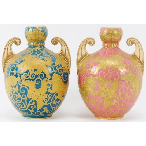 48 - Two rare Royal Crown Derby twin handled vases, circa 1884-85. Both of ovoid form with scale handles,... 