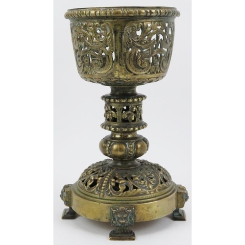 54 - A group of brassware items, 19th/20th century. Comprising a Victorian pierced brass receptacle with ... 