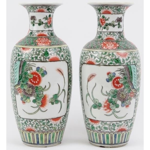 56 - A pair of Chinese Famille verte porcelain vases, late Qing dynasty. Decorated with panels depicting ... 