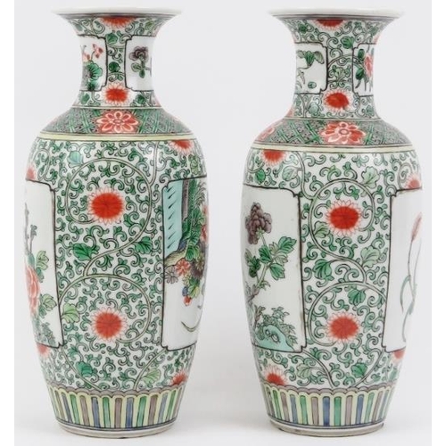 56 - A pair of Chinese Famille verte porcelain vases, late Qing dynasty. Decorated with panels depicting ... 