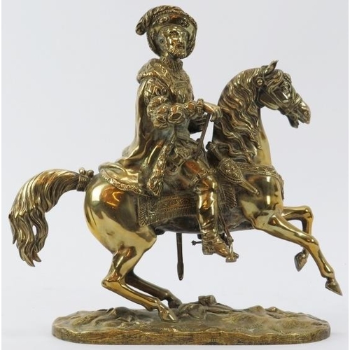 57 - A brass figure of the King Henry IV of France riding on horseback, 19th century. 26.8 cm height.
Con... 