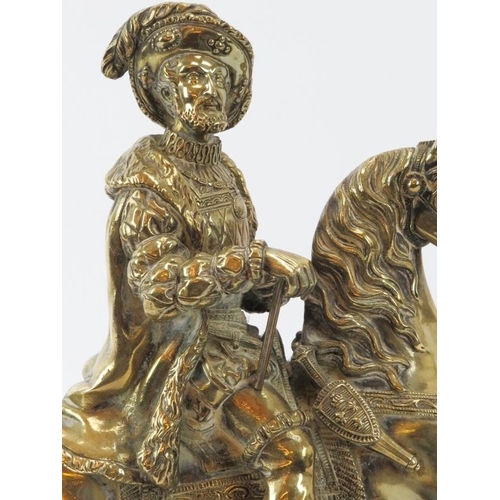 57 - A brass figure of the King Henry IV of France riding on horseback, 19th century. 26.8 cm height.
Con... 