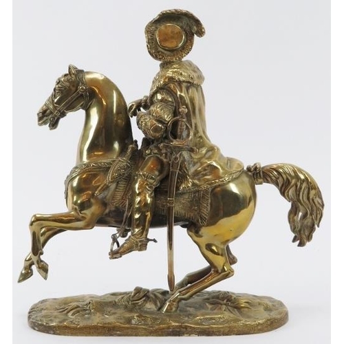 57 - A brass figure of the King Henry IV of France riding on horseback, 19th century. 26.8 cm height.
Con... 