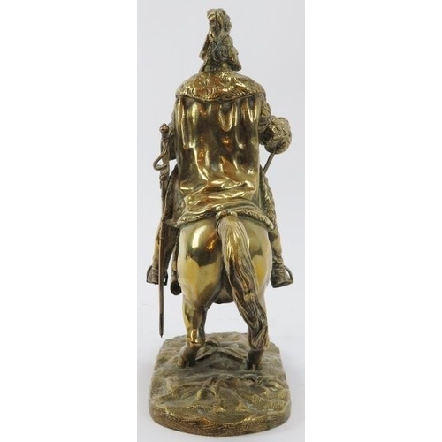 57 - A brass figure of the King Henry IV of France riding on horseback, 19th century. 26.8 cm height.
Con... 