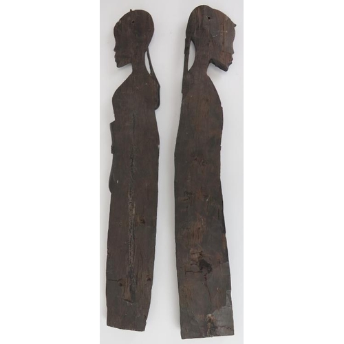 69 - Tribal Art: A pair of large African Massai tribe figural hardwood carvings, 20th century. Both femal... 