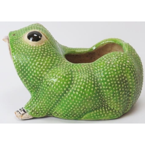 71 - A European majolica ceramic toad jardiniere. Modelled with an open mouth and nostrils. 23 cm length.... 