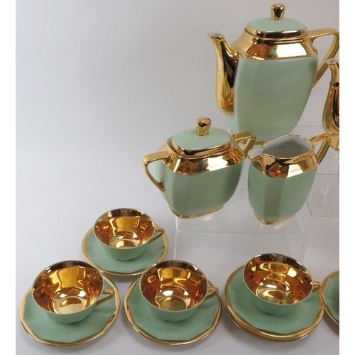 83 - A Limoges ‘R.G. Montigny’ pattern tea set and a Royal Worcester ‘Fireproof’ set. Twenty one pieces o... 