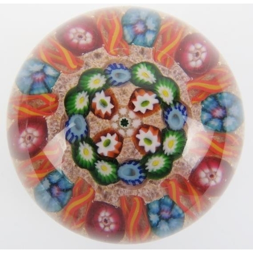 85 - A group of three millefiori glass spoke paperweights, attributed to Paul Ysart. Each paperweight dec... 