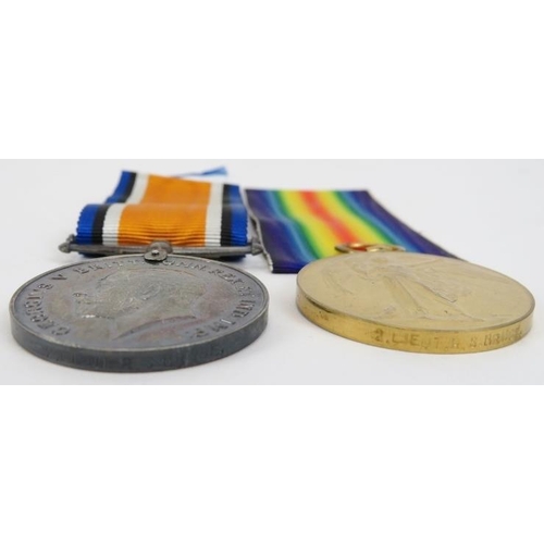 96 - Militaria: A group of three WWI British Army medals presented to Private/2nd Lieutenant R S Bruce of... 