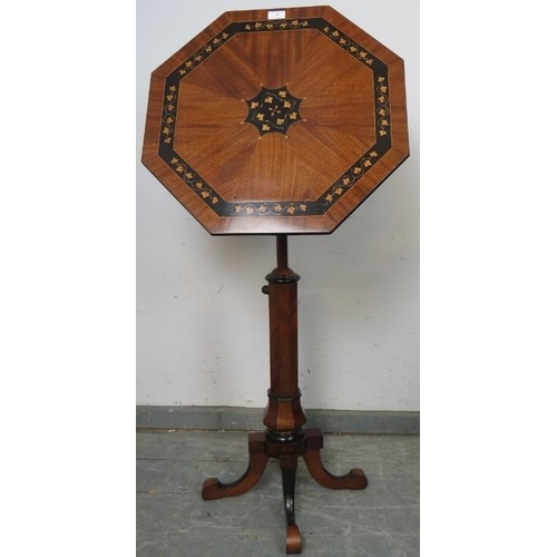 706 - A 19th century mahogany octagonal tilt-top table/music stand with ebonised and satinwood foliate inl... 