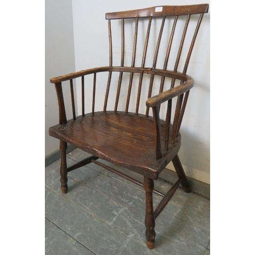 707 - An 18th century elm stick-back Windsor chair, on turned canted supports with an ‘H’ stretcher. 
H96c... 