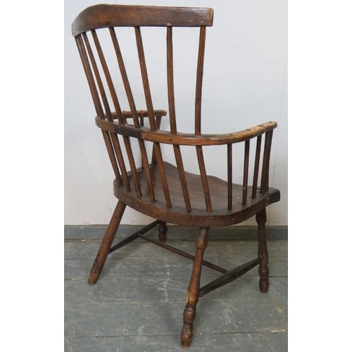 707 - An 18th century elm stick-back Windsor chair, on turned canted supports with an ‘H’ stretcher. 
H96c... 