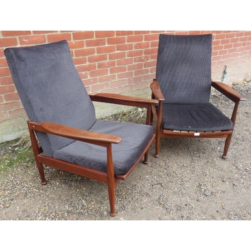 708 - A pair of mid-century hardwood ‘Manhattan’ reclining armchairs by Guy Rodgers, upholstered in patter... 