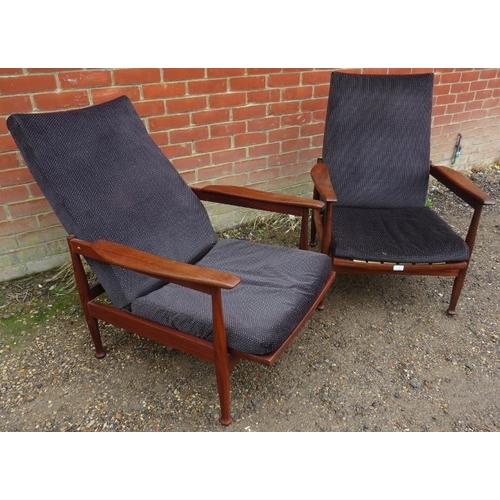 708 - A pair of mid-century hardwood ‘Manhattan’ reclining armchairs by Guy Rodgers, upholstered in patter... 