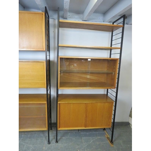 709 - A mid-century teak 'Ladderax' two-bay modular wall system by Staples & Co, comprising two glazed dis... 