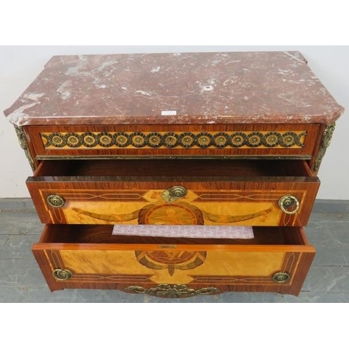 715 - A vintage French kingwood commode chest in the 18th century taste housing three long graduated drawe... 