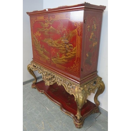 716 - A vintage Art Deco Revival Chinoiserie drinks cabinet, the doors opening onto a maplewood-lined fitt... 