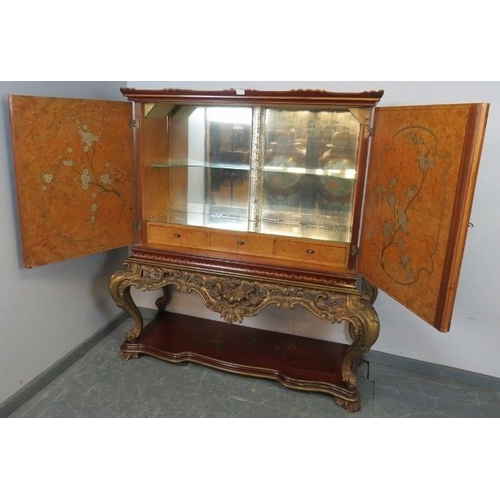 716 - A vintage Art Deco Revival Chinoiserie drinks cabinet, the doors opening onto a maplewood-lined fitt... 