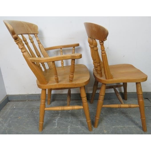 734 - A set of six (4+2) light oak farmhouse kitchen chairs with spindle backs, on turned canted supports ... 