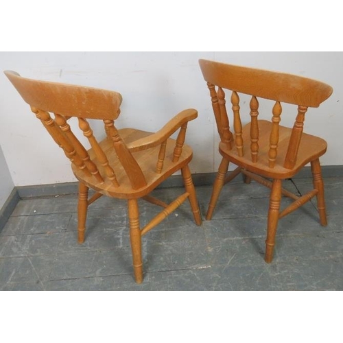 734 - A set of six (4+2) light oak farmhouse kitchen chairs with spindle backs, on turned canted supports ... 