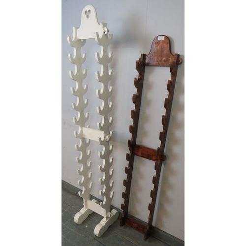 740 - Two vintage walking stick racks, one wall mounted, the other freestanding with pierced trefoil detai... 