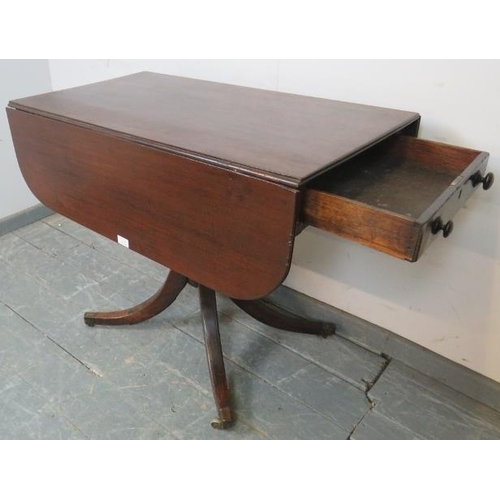 749 - A Regency Period mahogany supper table, housing single drawer and dummy drawer strung with ebony, on... 