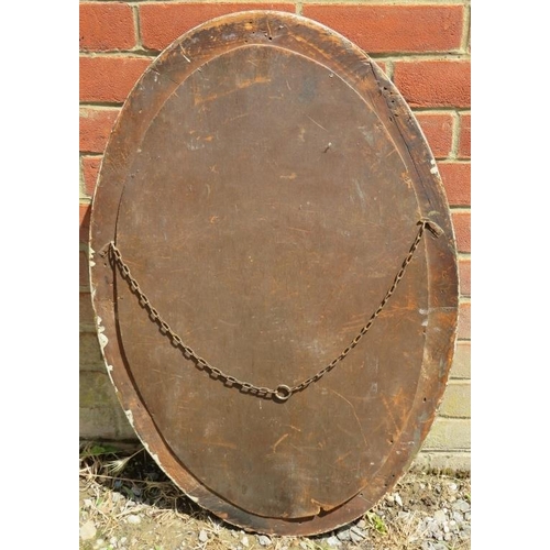 757 - A 19th century oval bevelled wall mirror, in a moulded gilt gesso surround. 
H82cm W54cm D4cm (appro... 