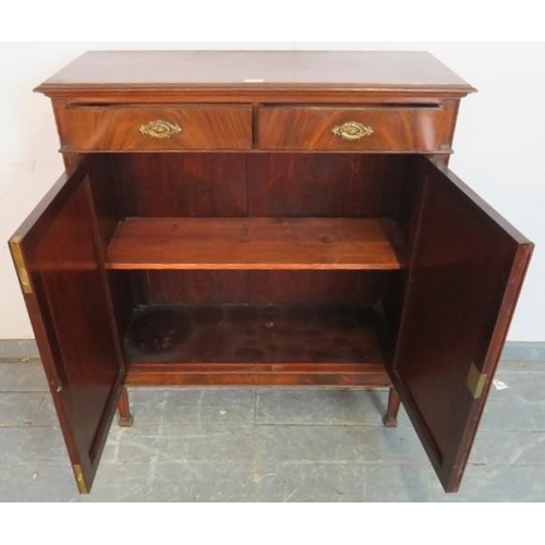 764 - A good quality Edwardian flame mahogany side cabinet, housing two short drawers with fancy gilt bras... 