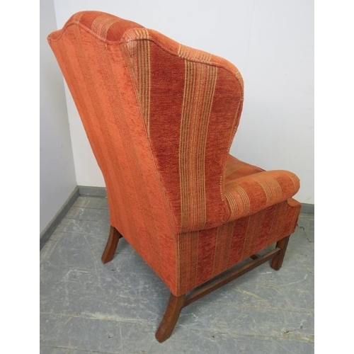 768 - A good quality Georgian-style wingback armchair by Artistic Upholstery, upholstered in striped terra... 