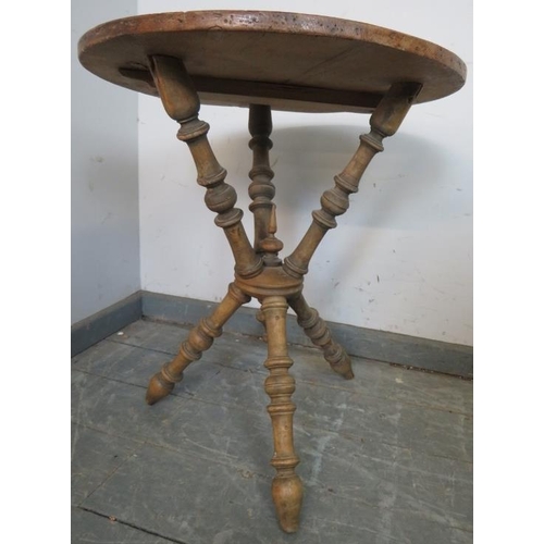 790 - An antique pine and beech gypsy table, on turned tripod supports with centre finial and inverted fin... 