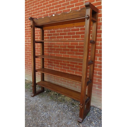 807 - A vintage hardwood Dutch cheese rack, of four open shelves, on square side supports with rail feet. ... 