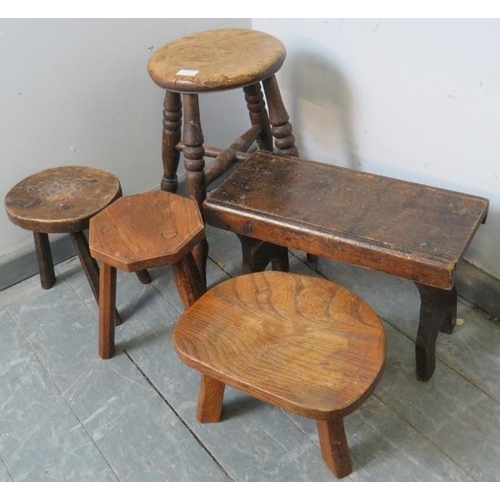 813 - A selection of five diminutive antique stools of various forms. 
Largest measures H46cm W30cm D28cm ... 