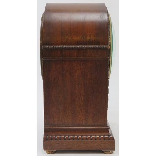 103 - An Edwardian mahogany Harrods mantle clock. French movement. 31 cm height. 
Condition report: Some w... 