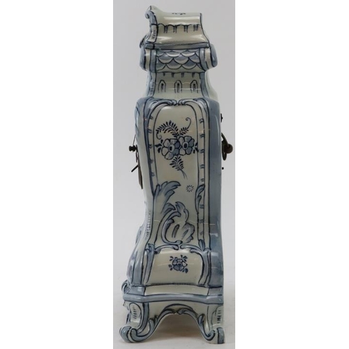 106 - A German Delft style ceramic mantle clock. French brass movement. Identical in style to German clock... 