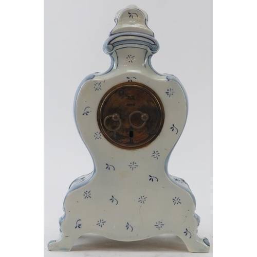 106 - A German Delft style ceramic mantle clock. French brass movement. Identical in style to German clock... 