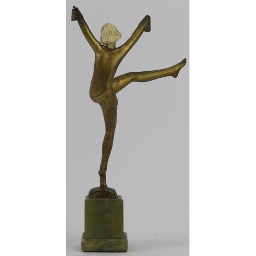 113 - A Stefan Dakon gilt bronze, ivory and onyx female dancing figure, circa 1930. Marked Dakon to the on... 