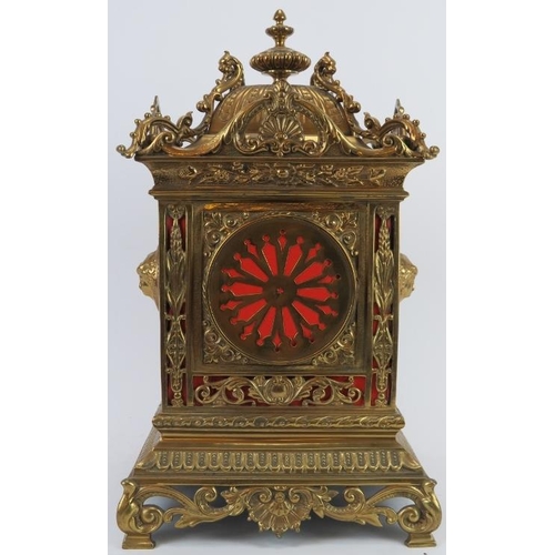 123 - A large ornate European brass mantle clock, 20th century. Pendulum included. 41 cm height.
Condition... 