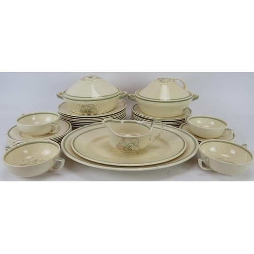 125 - A Susie Copper ‘Magnolia’ pattern part dinner service. Comprising seven dinner plates, six dessert p... 