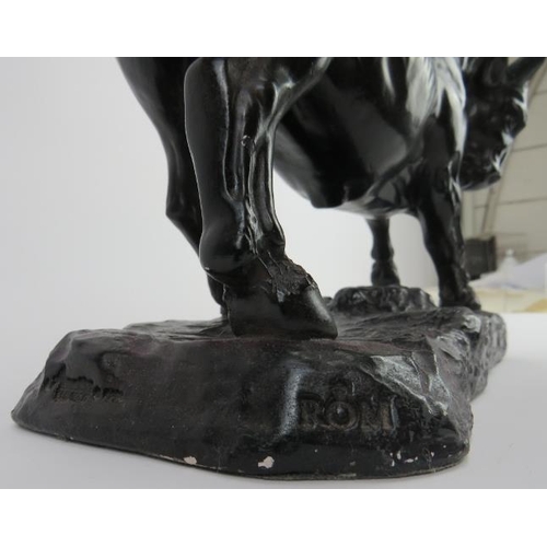 135 - A large Austin Productions bronzed model of a charging bull, 20th century. Signed ‘Milet’ with impre... 