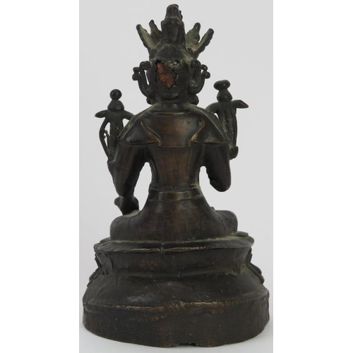 154 - A Tibetan bronze Buddhist figure of the Goddess Tara, 19th century. The bodhisattva depicted seated ... 