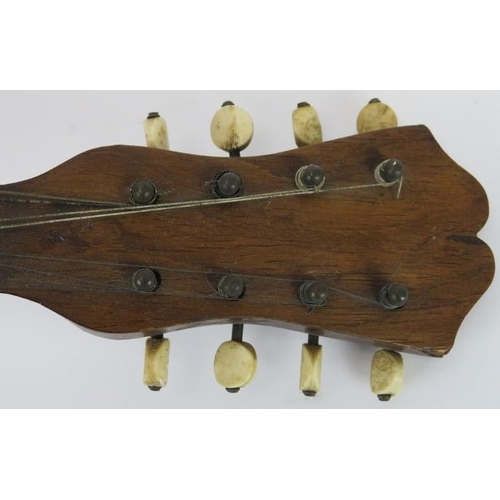 162 - A Neapolitan Stridente mandolin, late 19th/early 20th century. With a rosewood back, parquetry inlai... 