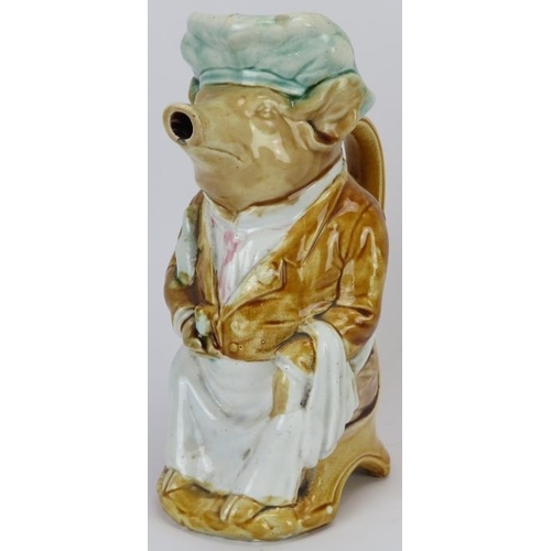 163 - A French majolica toby jug in the form of a pig dressed as a waiter, late 19th/early 20th century. 2... 