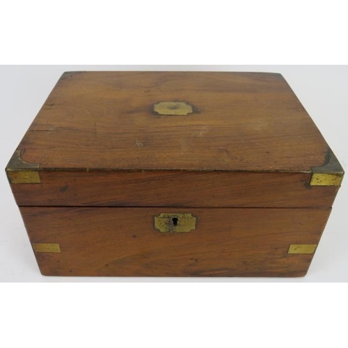 165 - A Victorian brass mounted walnut writing slope box with fitted interior. Key included. 30 cm length.... 