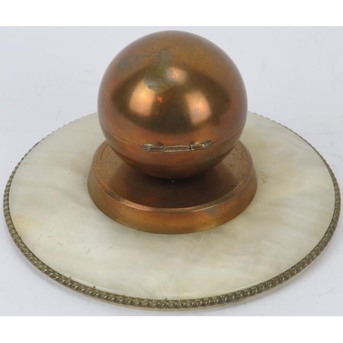 179 - An Art Deco spherical gilt metal, brass and onyx desktop inkwell, early/mid 20th century. 16.2 cm di... 