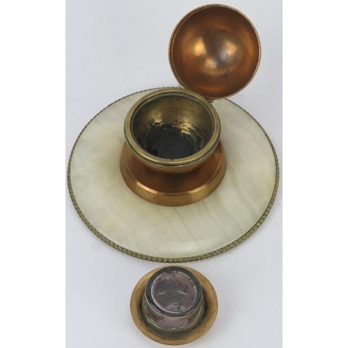 179 - An Art Deco spherical gilt metal, brass and onyx desktop inkwell, early/mid 20th century. 16.2 cm di... 