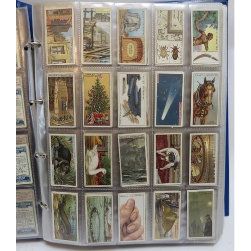 184 - A large collection of cigarette cards in two volumes, late Victorian period and later. Makers includ... 